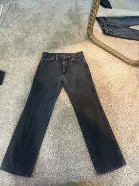 Vintage Wrangler Black Denim Jeans with Contrast Pocket Lining fits like a 26/27